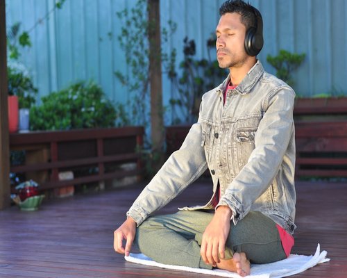 serene person practicing mindfulness and breathing